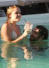 Miley Cyrus - Bikini at a Hotel Pool with Liam in Miami